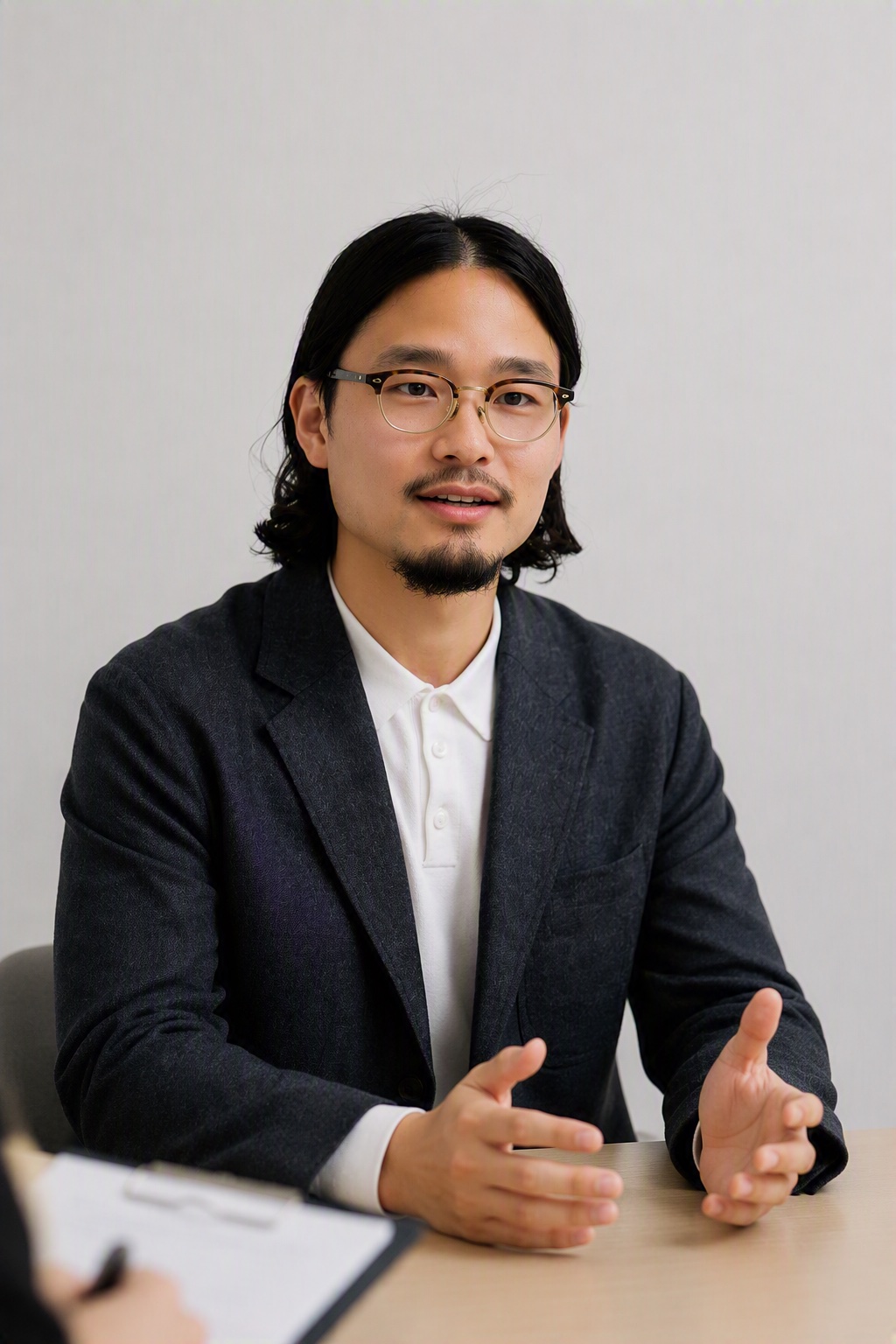 インタビューに答える帝人アクシア株式会社 川邉様